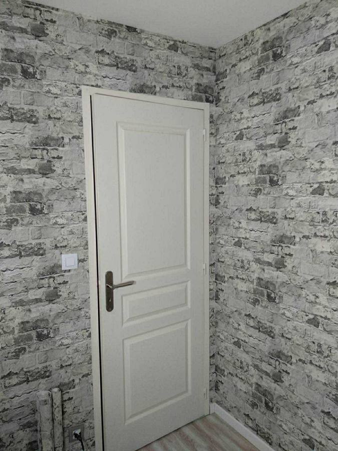 Peinture d'une porte à Dole – RUSHITI Rénovation, peintre à Besançon