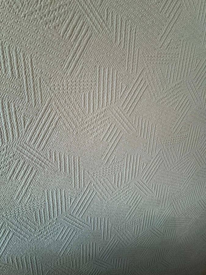 Pose de toile de verre dans une cage d'escalier à Besançon – RUSHITI Rénovation